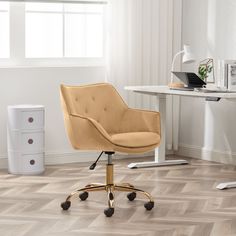 an office chair sits in front of a desk