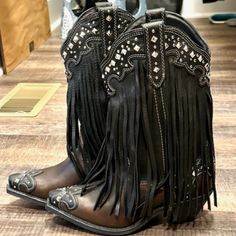 Brand New Without Tags Brand New, Never Worn! Hand Crafted Rockin Country Collection Women's Cowboy Boots Two-Tone Brown And Black With Studs And Fringe Western Boot Leather Uppers And Lining Size 7.5m * Hand Crafted Women's Western Boot * Crazy Horse Leather Foot & Upper * Steel Shank * Narrow Square Toe * Calf Skin Lining * Stacked Leather Heel * Leather Sole Leather Boots For Fall Festival, Fall Festival Leather Boots, Black Snip Toe Boots For Festival, Black Snip Toe Festival Boots, Leather Moto Boots For Rodeo In Fall, Leather Moto Boots With Pointed Toe For Western Events, Leather Pointed Toe Moto Boots For Rodeo, Leather Moto Boots With Pointed Toe For Rodeo, Leather Closed Toe Boots For Rodeo