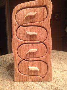 a close up of a wooden object on a table