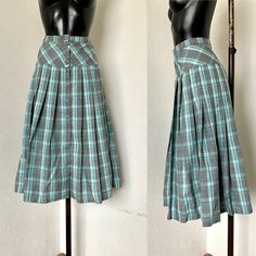 "Vintage Mid A Line Plaid Blue Gray Skirt Hip Pleated Accordion Check Skirt 90's Skirt Front Button up Soft Warm Viscose Skirt Size M/L ♥ Blue Lining ♥ 9 button up front Condition: Being vintage the item has been pre-owned but remains in very good vintage condition. Tag: No tags Materials: Viscose;  Size: On Tag 40 (Fits on M/L) Measurements : Length: 79cm = 31,1\" Waist: 82cm = 32,2'' Hips : 124cm =48,8'' **Measurements are taken with the garment lying flat. (Some sizes then doubled - Bust, Waist, Hips). Be sure to leave room for movement and comfort** Additional Notes: Please note that due to the nature of vintage clothing, ALL ITEMS ARE SOLD AS-IS; with no returns or exchanges, regardless of fit or condition. We try our best to give as much measurements as possible, note each minor issu Viscose Skirt, Check Skirt, Pleated Skirts, Womens Skirts, 50s Fashion, Nice Shorts, Gray Skirt, Latvia, Blue Gray