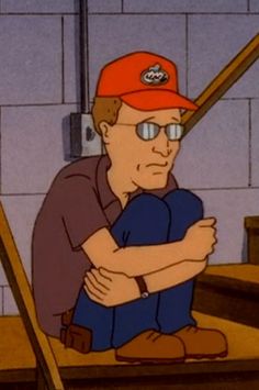 a cartoon character sitting on the ground with his arms crossed and wearing a baseball cap