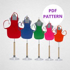 five aprons on wooden poles with the words pdf pattern above them in different colors