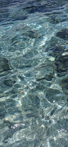 the water is crystal blue and clear with little bubbles on it's bottom half