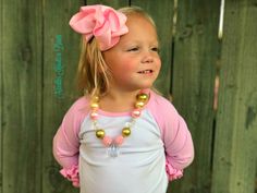 . This Pink & Gold Chunky Bead Bubblegum necklace is sure to make girl that puts it on feel like the princess that she is. Girls love accessories and this one is a "Must Have" as it is just so pretty and sure to give any outfit that "WOW" factor and the smile it gives her when she / you is wearing it helps. This necklace measures 22" long. It does have 2" of an extended chain so that you can change the length if you wish. The clear pendant is 1 1/2" long ****CHOKING HAZARD DISCLAiMER***** Never Cute Pink Flower Necklace, Playful Pink Beaded Necklaces For Birthday, Playful Pink Beaded Necklaces For Birthdays, Playful Pink Beaded Necklace For Birthday, Cute Pink Beaded Necklaces For Birthday, Flower Girl Necklace, Girls Necklace, Bubblegum Necklace, The Smile