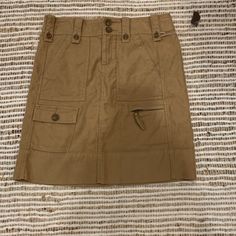 Khaki Mini Skirt Cargo Style Nwt And Buttons Size 0 Fits Around A 2-4 Tho Boy Skirt, Green Denim Skirt, Khaki Mini Skirt, Skirt Cargo, Tulle Mini Skirt, Button Down Denim Skirt, Camo Mini Skirt, Silk Mini Skirt, Paper Boy