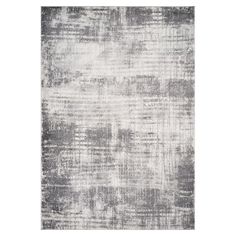 a gray and white rug with an abstract design