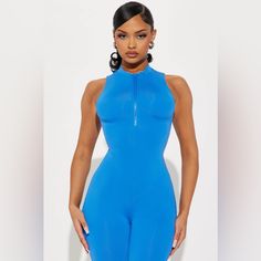 Never Used. Size Large. Amazing Stretch. Snatches Your Waist Blue Stretch Jumpsuits And Rompers For Night Out, Casual Blue Bodysuit For Night Out, Trendy Blue Bodysuit For Night Out, Blue Stretch Sleeveless Jumpsuits And Rompers, Blue Stretch Sleeveless Jumpsuit, Blue Sleeveless Stretch Jumpsuits And Rompers, Blue Sleeveless Stretch Jumpsuit And Romper, Light Blue Fitted Sleeveless Bodysuit, Fitted Light Blue Sleeveless Bodysuit