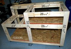 three wooden shelves with measurements for the top and bottom sections on each shelf in front of them