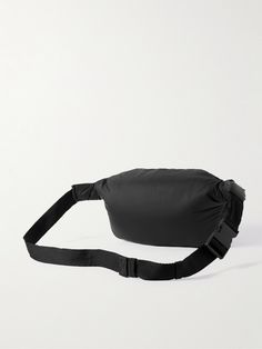 Balenciaga's 'Explorer' belt bag is as practical as it is cool. Made from nylon and quilted for a puffed-up shape, it's fitted with two zipped pouches to organise your belongings and has an adjustable fastening. Wear it around your waist or slung over one shoulder. Belt Bag For Men, Balenciaga Bag, Black Nylons, Blue Bags, Belt Bag, Labour Day, Messenger Bag, Balenciaga, Zip Pockets