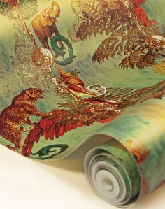 a roll of wrapping paper with an image of animals on it