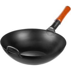 an empty frying pan with a wooden handle