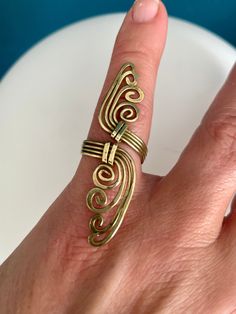 Beautiful Handmade Brass Ring made by Qory in Peru. Size approximately 6-9 Brass is a blend of Copper and Zinc. Brass amplifies energy & creates balance in the body. Copper is a natural anti-microbial. For more information on the Artist or our shop please check out our website @ jewelryartistas.com or on Instagram @ jewelry_artistas Ring Splints, Diy Wire Jewelry Rings, Wire Jewelry Rings, Aluminum Jewelry, Instagram Jewelry, Diy Wire Jewelry, Handmade Brass, Handmade Wire Jewelry, Wire Rings