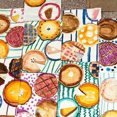 an art project made with colored pencils and watercolor paper, including pies