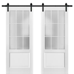 two white doors with black hardware on each side