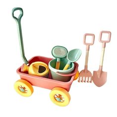 a toy wagon with gardening utensils in it