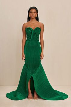 A sculpturally designed plissé strapless gown featuring a exaggerated train and artful bust. — Sculpted plissé fabric — Rose bud shaped bust details — Exaggerated train — Mermaid tail hem Fashion Couture, Rose Bud, Strapless Gown, Gala Dresses, Cult Gaia, Mermaid Tail, Fabulous Fashion, Red Carpet Looks, Spring 2024