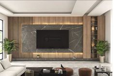 a modern living room with marble walls and floor to ceiling entertainment center, built into the wall