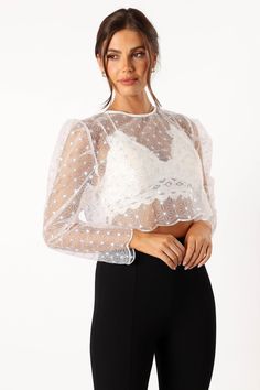 DETAILS
The lace shirt design adds a touch of femininity, while the high round neckline elongates your neck and accentuates. The functional button closure allows you to feel comfortable all night long, giving you the perfect fit every time.


lace shirt style
high round neckline
long sleeve

scalloped hemlines
button close
unlined


material - 100% polyester









SIZING

model is 5' 7" and wears a Size S
model stats: bust - 33", waist - 27", hips - 36"















GARMENT CARE

cold hand Fitted Lace Mesh Top With Lace Trim, Elegant Spring Mesh Top, Elegant Sheer Crew Neck Top, Feminine Long Sleeve Lace Top For Party, Feminine Lace Patchwork Stretch Top, Elegant Fall Tops With Lace Patchwork, Feminine Stretch Lace Patchwork Top, Elegant Stretch Lace Mesh Top, Feminine Sheer Lace Top For Night Out