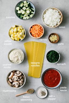 ingredients to make lasagna noodles laid out in bowls