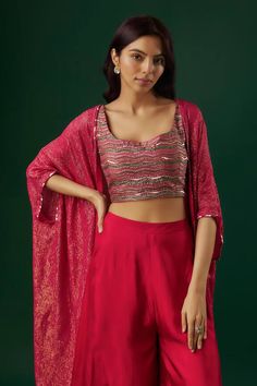 Fuchsia red cape with textured patterns with sequin embellishments. Comes with padded sequin chevron motif blouse and sharara. - Aza Fashions Festive Front Open Sharara For Party, Semi-stitched Tops With Dupatta For Festive Occasions, Front Open Resham Embroidered Dupatta For Party, Party Dupatta With Resham Embroidery And Front Open Design, Festive Fusion Style Dupatta For Party, Festive Fusion Style Party Dupatta, Fusion Style Saree Set With Zari Work, Fusion Saree Set With Zari Work, Fusion Style Party Dupatta With Pallu