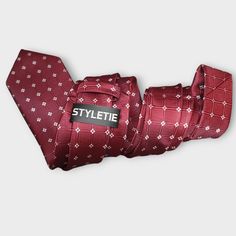 Elevate your formal wear wardrobe with our Wine Red Plaid Floral Silk Tie Pocket Square Cufflink Set. Made from the finest quality silk, this set features a stunning combination of plaid and floral patterns in a rich wine red color. 100% Silk Handmade Package Includes: Tie, Pocket Square & Cufflinks. Length: 59" Width: 3.34" Warm iron if needed Classic Burgundy Suit And Tie Accessories For Business, Dapper Red Suit And Tie Accessories For Formal Events, Dapper Red Suit And Tie Accessories For Formal Occasions, Classic Burgundy Suit And Tie Accessories For Formal Occasions, Elegant Burgundy Suit And Tie Accessories For Business, Classic Red Suit And Tie Accessories For Business, Classic Red Suit And Tie Accessories For Semi-formal Occasions, Elegant Burgundy Suit And Tie Accessories For Semi-formal Occasions, Classic Red Suit And Tie Accessories