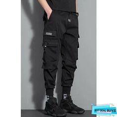 Streetwear Activewear Trousers With Pockets, Hip Hop Bottoms With Pockets For Sports, Casual Black Cargo Pants For Sports, Urban Black Activewear With Side Pockets, Sportswear Style Bottoms With Cargo Pockets For Streetwear, Cotton Techwear Sports Bottoms, Baggy Joggers With Cargo Pockets For Sports, Hip Hop Style Sweatpants With Side Pockets For Sports, Baggy Sports Activewear With Pockets