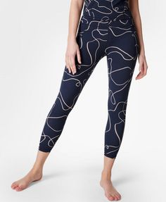 Our bestselling studio leggings with a super soft, sculpting feel. Buttery soft fabric is breathable, sweat-wicking and 90% squat-proof. Super-high-waisted with snug compression and an internal adjustable drawcord. Carefully placed seams along the leg. Side slip pocket for your phone. Inseam length: 60cm / 24". Model wears size S and is 178cm/5'10"tall. Style Code: SB6916A 78Colour: Blue Line Flow Print Athleisure Capris For Yoga With 4-way Stretch, Athleisure Yoga Capris With 4-way Stretch, 4-way Stretch Yoga Capris, 4-way Stretch Yoga Capris Athleisure, 4-way Stretch Capri Yoga Pants For Pilates, Athleisure Yoga Compression Capris, Athleisure Capri Length Leggings For Yoga, Compressive Capri Length Workout Leggings, High Stretch Athleisure Capris For Pilates