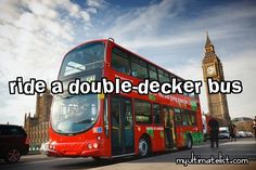 a red double decker bus driving past big ben