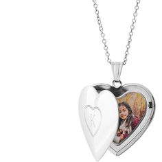 Made of stainless steel, with your choice of silver, gold or rose gold finish. Oval Locket measures 1.2 x 0.9, photo insert measures 0.9 x 0.6. Heart Locket measures 1.07 x 1.09, photo insert measures 0.8 x.85. Engraving available on front side only. Photos already sized and inserted inside. Comes with 18 coordinating chain and gift box. Imported. Personalized in USA Personalized Open Heart Locket Necklace For Keepsake, Engraved Heart Locket Necklace, Personalized Gift, Heart-shaped Locket Necklace In Stainless Steel, Heart-shaped Locket For Memorial, Memorial Heart-shaped Nickel-free Locket Necklace, Oval Locket, Heart Locket Necklace, Jewelry Lockets, Photo Locket