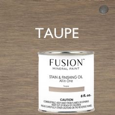 a close up of a paint can with the words taupe in white on it