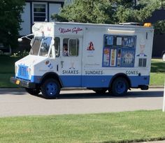 an ice cream truck driving down the street