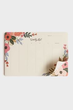 an image of a desk calendar with flowers on the front and back side, which reads weekly list