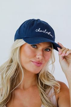 Calling all Charleston residents, the Charleston Script Embroidered Hat was made just for you! This cute hat is made of a soft cotton construction. It has a rounded top and a slightly rounded brim with "Charleston" embroidered on the front! Available in 3 colors. Adjustable Strap Embroidered 100% Cotton Spot Clean with Damp Cloth or Sponge One Size Fits Most Cotton Hats With Curved Brim, One Size Fits Most, Curved Brim Hat With Letter Embroidery, Adjustable Cotton Hats With Letter Embroidery, Cotton Cap Hat, Cotton Cap One Size Fits Most, Letter Embroidered Snapback Hat With Curved Brim, Embroidered Cotton Dad Hat With Flat Brim, Letter Embroidery Snapback Hat With Curved Brim, Everyday Cotton Hats With Letter Embroidery