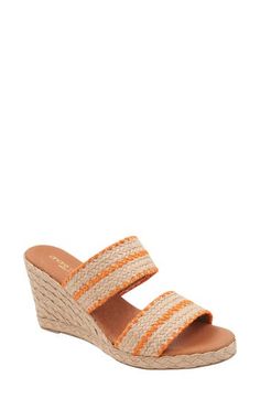 Woven raffia creates a boho aesthetic on an espadrille-inspired slide sandal lofted by a subtle platform and wedge heel. 3" heel; 1/2" platform Cushioned footbed Textile upper/leather lining and sole Made in Spain Orange Platform Wedge Sandals For Summer, Orange Wedge Sandals For Summer, Orange Sandals With Woven Sole For The Beach, Orange Slip-on Sandals For Summer, Orange Open Toe Wedge Sandals For Summer, Orange Beach Sandals With Woven Sole, Orange Open Toe Wedge Sandals For Spring, Summer Orange Slip-on Sandals, Spring Orange Open Toe Wedge Sandals