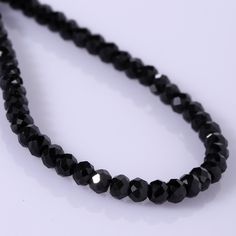 Black Spinel is a protective stone that repels negativity and grounds the user while revoking inspiration and empowerment, without overwhelming others. It is also thought to help one find calmness and let go of resentments to re-establish relationships and dispel sadness. This necklace features shiny and beautiful black spinel faceted rondelle. The stones are strung on high quality beading wire and the necklace closes with a lobster claw. Handmade Necklace Gemstone : Spinel Gemstone Color: Black Black Spinel Jewelry, Black Gemstone Necklace, Black Spinel Necklace, Spinel Necklace, Spinel Jewelry, Spinel Gemstone, Gemstone Beaded Necklace, Party Necklace, Round Necklace