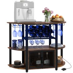 a wine rack with bottles and glasses on it