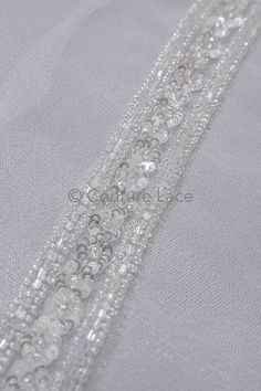 Beautiful beaded lace trim with transparent & silver glitter beads & crystals. Are you looking for the perfect finishing touch for your dream wedding dress? Then look no further! Introducing our exquisite lace trim designed specifically for wedding dresses. Crafted with the utmost care and attention to detail, our lace trim is made from the finest materials for a luxurious and elegant look. The delicate floral pattern adds a touch of romance and sophistication to any wedding dress, making it the For Wedding Dresses, For Wedding Dress, Silver Lace, Bridal Belt, Lace Edging, Bridal Lace, Dream Wedding Dresses, Beaded Lace, Silver Glitter