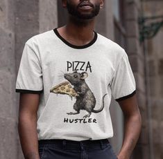 Pizza Hustler Ringer Shirt, Pizza Rat Lover Unisex Cotton Ringer T-Shirt 100% ring-spun cotton, with a contrasting 1x1 baby rib binding on the collar and sleeves to give it that classic style.  .: 100% combed, ring-spun cotton .: Light fabric (4.3 oz/yd² (146 g/m .: Classic fit Ringer Shirt, G M, Rats, San Jose, Light Fabric, Classic Style, Gender Neutral, Spun Cotton, Pizza