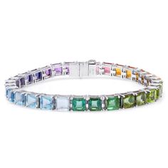 A vibrant combination of natural semi precious gemstones create a rainbow of red, pinks, orange, yellow, greens, violet and purples. Our multicolored gemstone bracelet contains a total of 40.72 carats of natural gemstones. It wears beautifully from day to night, and is crafted from 18 karat white gold. Multi Gemstone Bracelet, Rainbow Bracelet, White Gold Bracelet, Garnet Earrings, Yellow Gold Earring, Nature Bracelets, Gemstone Bracelets, Exquisite Jewelry, Precious Gemstones