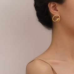 Our coating and high polish add secret ingredient to the rings for your contemporary & chic outfit. Abstract geometric earrings that will never go out of style, this jewelry piece is simple enough to accessorize easily but creative enough to make your look stand out. This pair of 18K gold statement earrings that compliments any outfit, easily create stylish look in Parisian, Minimalist, Bohemian, or even Punk. • S P E C I F I C A T I O N • Finish: 18K multi-layered gold plating on titanium steel Dimension: approx. 22 cm x 24mm For ring of this style please visit here. Modern Yellow Gold Plug Earrings, Elegant Open Circle Hoop Earrings Gift, Modern Hoop Earrings With Plating As A Gift, Minimalist Gold-plated Circle Earrings, Minimalist Gold Plated Circle Earrings, Modern Plated Hoop Earrings, Minimalist Plated Hoop Earrings As Gift, Minimalist Plated Hoop Earrings For Gift, Modern Plated Hoop Earrings For Gift