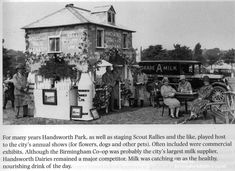 an old black and white photo shows people standing in front of a building with signs on it