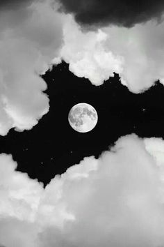 the moon is seen through some clouds in this black and white photo with an eerie effect