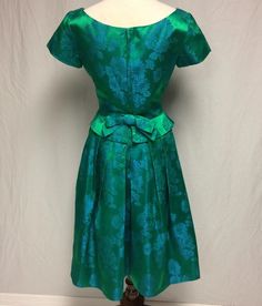 1950's Green/blue Satin Damask Dress RAPPI Peplum - Etsy Fitted Green Tea-length Dress, Green Pleated Bodice Cocktail Dress, 1950s Style Green A-line Dress, Green Silk Dress With Pleated Bodice, Green Tea Length Dress For Wedding, Green Tea-length Wedding Dress, Green Retro Cocktail Dress, Green Tea Length Party Dress, Green Satin Dress For Garden Party