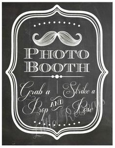 a chalkboard sign with the words photo booth and mustache on it's side