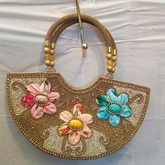 This Is A Adorable Mini Hand Beaded Purse. It Is. Clean On The Inside. The Purse Has Beautiful Detail The Colors Are Scream Summer. When Going Out For A Cocktail Who Wants A Big Bag A Small Bag Is Much More Convenient. Designer Pink Embellished Bags, Traditional Pink Beaded Bags, Designer Embellished Multicolor Bags, Designer Multicolor Embellished Bags, Summer Wedding Embellished Bag, Embellished Wedding Bags For Summer, Summer Wedding Embellished Bags, Festive Pink Embellished Bag, Festive Pink Embellished Bags