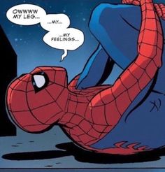 a spider - man is laying on the ground and talking to someone