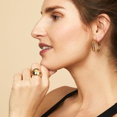 #All Italian for "dome" our Cupola Ring is a nod to the dome-shaped architecture seen all around the world. The polished, rounded design is an elegant and eye-catching sight, whether atop a historic building or poised on your finger. The Finer Points: #YellowGold-14kSolidGold-7 Metal: 14 Karat Yellow Gold Weight: 3.9 Grams Ring Size 7 Dimensions; 18.5mm Diameter Origin: Crafted in Istanbul, Turkey #YellowGold-14kSolidGold-8 Metal: 14 Karat Yellow Gold Weight: 4.1 Grams Ring Size 8 Dimensions: 18 Modern 14k Gold Domed Jewelry, Modern Oval Dome Ring, Tarnish Resistant, Modern Oval Dome Ring Tarnish Resistant, Luxury Domed Jewelry, Modern 14k Gold Dome Ring With Shiny Finish, Timeless Domed Wide Band Ring In Yellow Gold, Timeless Domed Yellow Gold Wide Band Ring, Timeless 14k Gold Domed Jewelry, Modern 14k Gold Oval Dome Ring