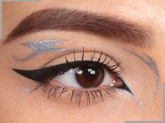 SILVER PEARL is a light silver eyeliner with a pearlescent finish. Comes with a FREE eyeliner brush!  NEW! Our water activated eyeliners are so easy to use and will last forever! Simply put a drop of water. Swirl brush around to make it paste, then apply! Can also be used for eyeshadow art and body paints. Comes with a free eyeliner brush! Mineral eyeliners are made from pigments straight from Mother Earth's finest ingredients. No harsh chemicals, synthetic dyes, preservatives, fragrances, dyes, Makeup Silver Eyeliner, Hooded Eye Silver Makeup, Easy Graphic Eyeliner, Colorful Graphic Liner, Water Activated Eyeliner, Graphic Liners, Eyeshadow Art, Creative Eyeliner, Cake Eyeliner