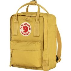 Keep your little adventurer exploring with their gear on their back in the Fjallraven Kanken Mini 7L Backpack. Crafted from tough Vinylon F, this little knapsack defends against dirt and stains, and its miniature compartment is just right for an extra jacket and gloves should the weather change. A zippered front pocket is perfect for snacks in case they get hungry, and the handles at the top allow it to convert into a side bag if you want to borrow it for the day. Practical Nylon Backpack For Adventure, Functional Camping Backpack With Adjustable Strap, Durable Backpack For Camping, Durable Practical Backpack For Camping, Durable Standard Backpack For Camping, Casual Nylon Bag For Adventure, Backpack With Logo Patch For Outdoor Activities, Casual Backpack For Adventure And Back To School, Casual Nylon Backpack For Adventure