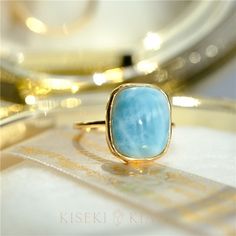 18k Solid Gold Rectangle Larimar Statement Ring, Large Larimar Gold Ring, Natural Larimar Jewelry, Healing Stone, Geometric Cocktail Rings DETAILS ♡⃛ ⃛ Main stone: Larimar; approx. 10x14mm Side stone: - Band width: 1.5mm Band thickness: 1.2mm OUR GEMSTONES ♡⃛ ⃛ At Kiseki Kiara, we use both precious and semi-precious stones throughout our jewelry designs, with each stone set-by-hand in our workshop. We carefully source gemstones for their quality and color ensuring you receive the best quality st Elegant Turquoise Larimar Ring As Gift, Pinky Rings For Women, Luxury Jewelry Box, Dainty Engagement Rings, Larimar Ring, Larimar Rings, Larimar Jewelry, Hypoallergenic Jewelry, Blue Topaz Ring